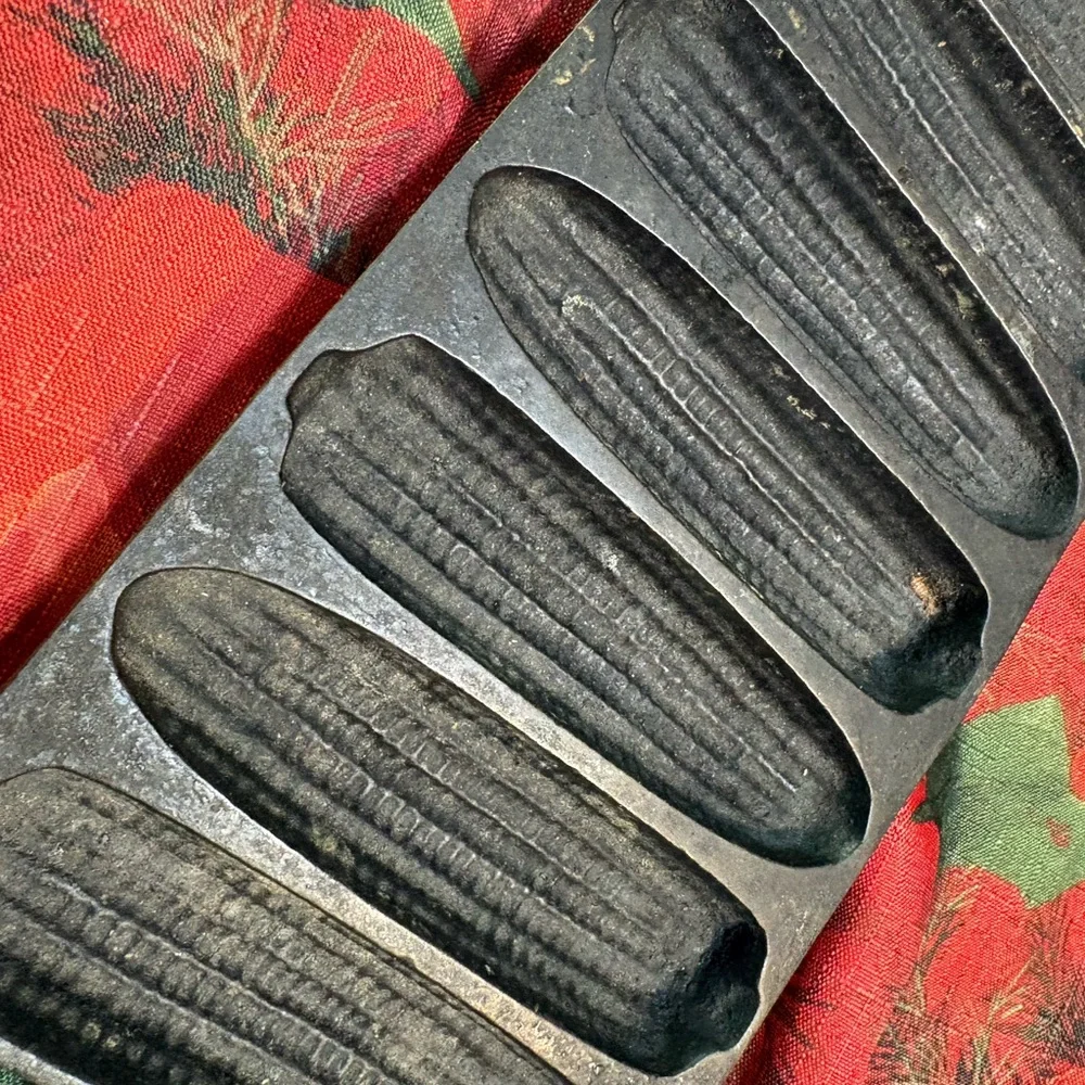 cast iron cornbread pan designed to bake corncob-shaped sticks